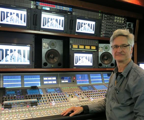 Hugh Healy at a Calrec Apollo broadcast audio mixing console