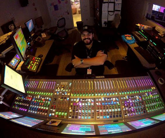 Alex Martinez working on a Calrec Artemis digital mixing console