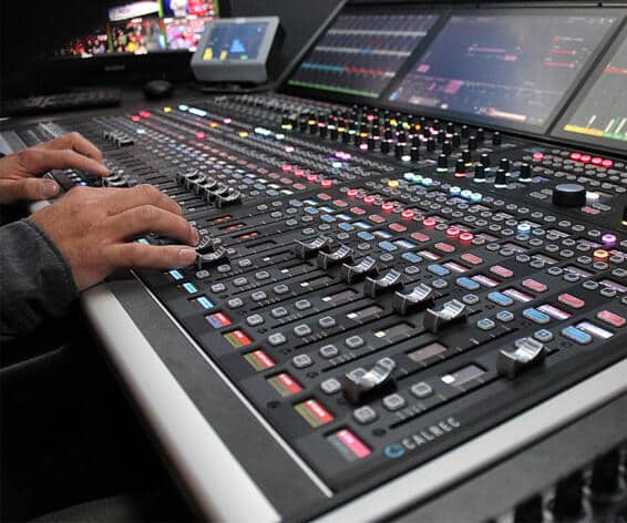 Daniel Poisson, Sound Engineer, mixing NHL on a Calrec Argo S IP audio mixing console at Montréal’s Bell Centre